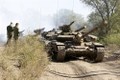 Các bên xung đột tại Ukraine rút vũ khí hạng nhẹ