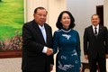 Tổng Bí thư, Chủ tịch nước Lào tiếp đoàn đại biểu cấp cao Đảng ta