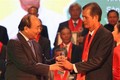政府总理阮春福出席“革新30年自豪越南农民”表彰大会并讲话