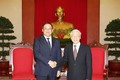 越共中央总书记阮富仲会见老挝政府副总理宋赛•西潘敦