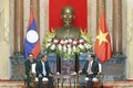 Chủ tịch nước Trần Đại Quang và Thủ tướng Nguyễn Xuân Phúc tiếp Bộ trưởng An ninh Lào