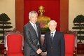 越共中央总书记阮富仲会见新加坡总理李显龙