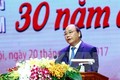 政府总理阮春福出席“光荣越南-30年革新的烙印”活动