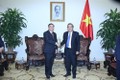 张和平副总理会见老挝建国阵线副主席禅塔翁