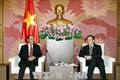 越南国会副主席冯国显会见老挝国会经济、技术和环境委员会主任