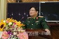 越南高级军事代表团对老挝进行正式访问