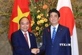 日本首相安倍晋三为越南政府总理阮春福举行隆重欢迎仪式