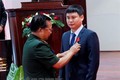老挝向越南军队电信集团在老挝联营体授予劳动勋章