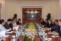 越共中央经济部部长阮文平会见越南企业论坛联盟工作代表团
