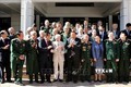 老挝人民革命党总书记、国家主席本扬会见前越南援老志愿军和专家代表团