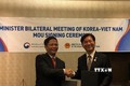 越韩同意促进经贸投资合作