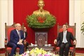  越共中央经济部部长阮文平会见俄罗斯天然气工业股份公司副总裁和哈佛大学教授代表团