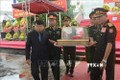 河静省为援老牺牲的越南志愿军和专家烈士举行追悼会和安葬仪式 