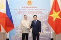 越南政府副总理兼外交部长范平明同菲律宾外交部长举行会谈