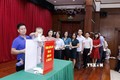 旅居老挝越南人为老挝灾民捐款
