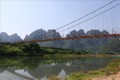 Người dân Hòa Bình vui mừng khi cầu treo bắc qua sông Bôi được sửa chữa