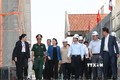 越南国会主席阮氏金银到老挝国会大厦施工现场视察督导