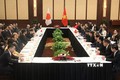 越共中央组织部长范明政会见日本自民党秘书长二阶俊博