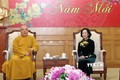 越共中央民运部长张氏梅会见越南佛教协会中央委员会代表团