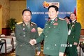 2020东盟轮值主席年：越南国防部长吴春历与老挝国防部长占沙蒙•占雅拉举行会晤