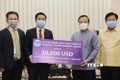 越南企业与老挝政府携手共同抗击新冠肺炎疫情