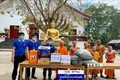  新冠肺炎疫情：旅居老挝越南人同所在地政府携手应对疫情