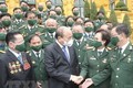 越南国家主席阮春福会见越南老兵商会优秀代表
