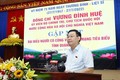 国会主席王廷惠同广南省对革命有功者典范举行见面会