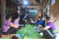 Bảo hiểm xã hội huyện Thuận Châu (Sơn La) tuyên truyền về chính sách bảo hiểm đến từng thôn, bản. Ảnh: Hữu Quyết - TTXVN