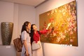 Khách tham quan triển lãm “Sản phẩm sơn mài Việt Nam”. Ảnh: Trần Lê Lâm - TTXVN