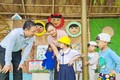 Thứ trưởng Bộ LĐ-TB&XH Lê Văn Thanh thăm trường mẫu giáo được đầu tư từ các chương trình mục tiêu quốc gia. Ảnh: baoquangnam.vn