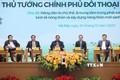 Thủ tướng Chính phủ Phạm Minh Chính và đại diện các bộ, ngành đối thoại với nông dân. Ảnh: Dương Giang - TTXVN