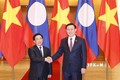 Chủ tịch Quốc hội Vương Đình Huệ hội kiến Thủ tướng Chính phủ Lào Phankham Viphavanh