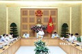 越南政府总理主持会议 为石油和航空企业化解困难