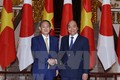 越南政府总理阮春福与日本首相菅义伟举行会谈