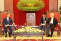 越共中央总书记、国家主席阮富仲会见日本首相菅义伟