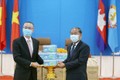 越共中央对外部向柬埔寨人民党捐赠3万只防疫口罩