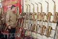 南定省范炮村努力弘扬西洋管乐器生产业