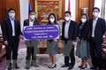 老挝人民继续与越南政府和人民携手抗击新冠肺炎疫情