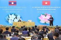 越南政府总理和老挝政府总理会见两国企业领导代表