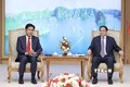 政府总理范明政会见老挝司法部部长帕维·西布阿利法