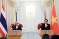 越南国家主席阮春福和泰国总理巴育·占奥差共同召开记者会