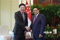 越南政府总理范明政会见新加坡副总理黄循财