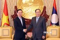 越南国家主席武文赏拜会老挝前高级领导人