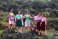 Các cô gái dân tộc H'Mông trong trang phục truyền thống tại Chợ tình Khau Vai. Ảnh: Thành Đạt - TTXVN