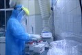 Xét nghiệm mẫu bệnh phẩm liên quan đến virus SARS-CoV-2 tại Trung tâm Y tế dựu phòng Hải Phòng. Ảnh: Minh Thu- TTXVN