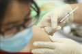 Tiêm vaccine COVIVAC cho 15 tình nguyện viên đợt hai. Ảnh: Minh Quyết - TTXVN