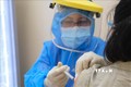 Bác sỹ Bệnh viện Hùng Vương Thành phố Hồ Chí Minh tiêm vaccine phòng COVID-19 cho thai phụ. Ảnh: TTXVN phát