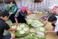 Đồng bào dân tộc Mông ở xã Tà Hừa, huyện Than Uyên (Lai Châu) làm bánh giầy vào dịp Tết Độc Lập. Ảnh: Quý Trung
