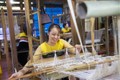 Hợp tác xã dệt thổ cẩm Chiềng Châu đã sử dụng số tiền vay từ Ngân hàng CSXH huyện Mai Châu để đầu tư xây dựng nhà xưởng và trang bị 12 máy công nghiệp, 2 máy vắt sổ cùng 50 khung dệt vải thổ, tạo điệu kiện việc làm cho hơn 30 chị em phụ nữ dân tộc Thái. Ả